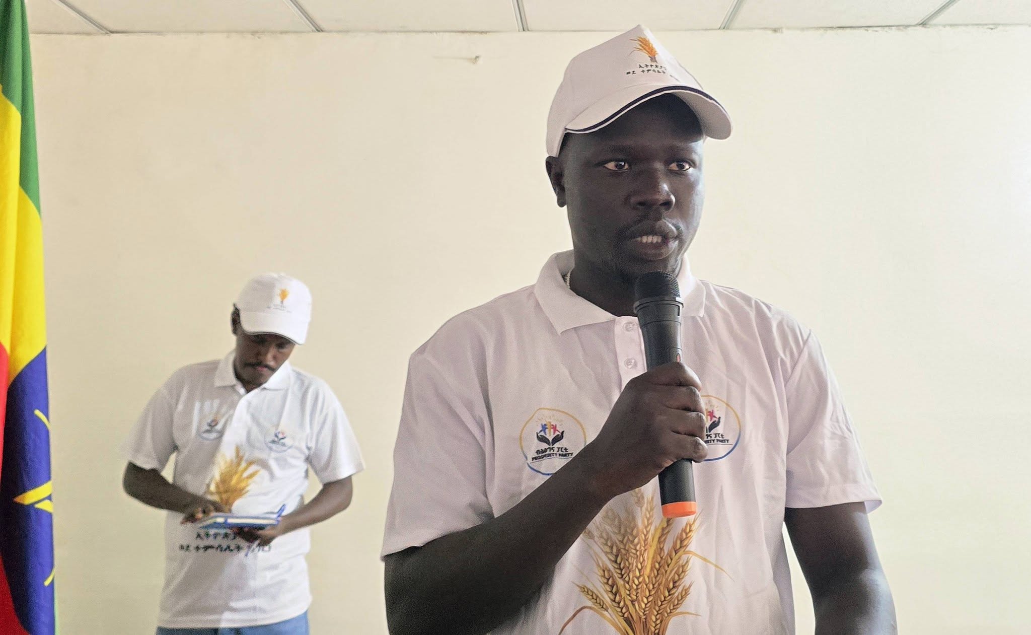 Dimma Woreda speaker addressing a party gathering